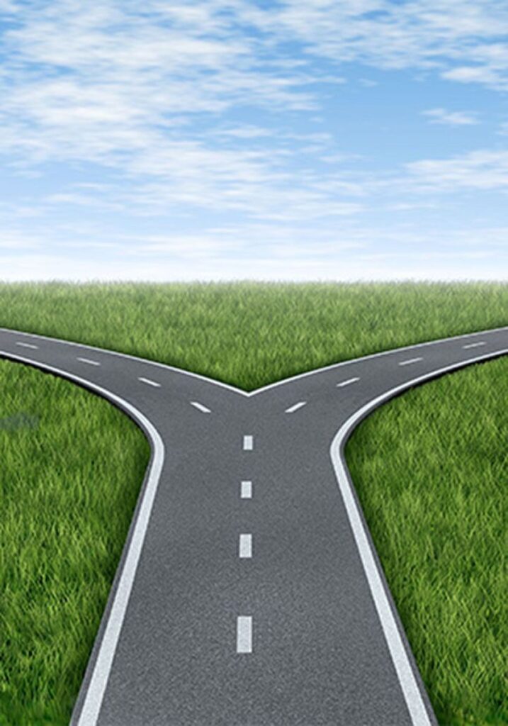 paved road splitting into opposite directions