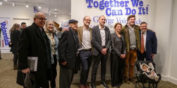 Councilman Mike Polensek, Elizabeth Sullivan, Dr. August Pust, Greg Nosan, Marc Ashed, Slovenian Consul General Susana Češarek, Brad and Trudy Nosan, and Joe Cimperman take a moment to celebrate.